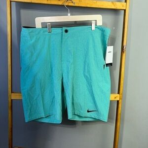 Men’s Nike four-way stretch button zipper closure swim trunks/shorts Size 36 NWT